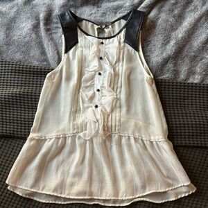 Free People sheer tuxedo style top with black shoulder detail, size Medium.